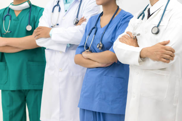 Medical people - doctors, nurse and surgeon. stock photo