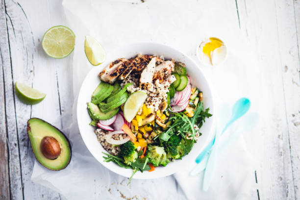 fresh Healthy Quinoa Bulgur bowl with vegetables and chicken