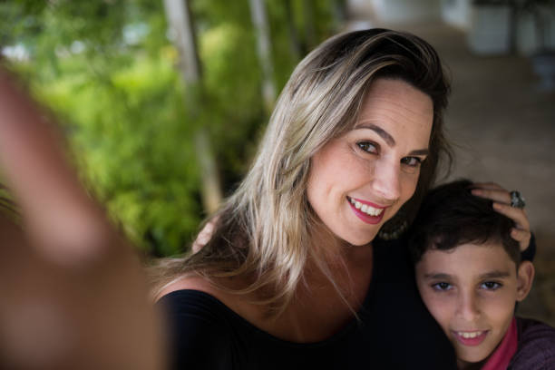 istock Mother taking selfie with son 924121516