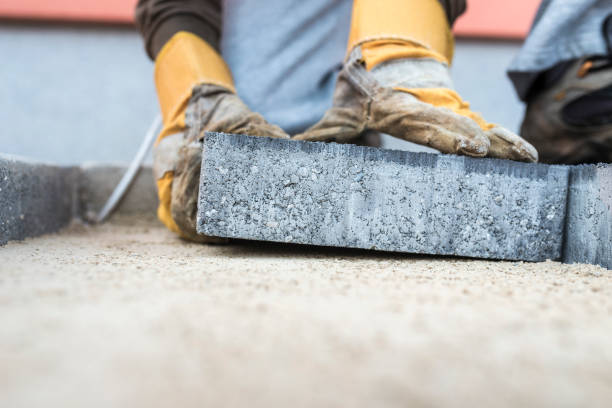 istock Building contractor laying a paving slab 924121674