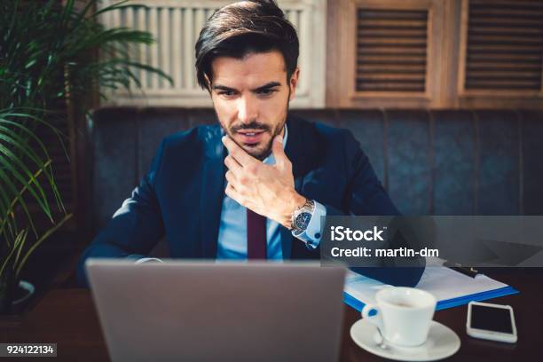 Businessman Using Computer At Coffee Break Stock Photo - Download Image Now - Businessman, Latin American and Hispanic Ethnicity, One Person