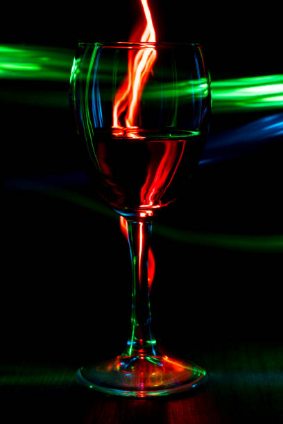 istock A glass of wine on a bright background with a bokeh effect. 924124446