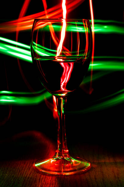 istock A glass of wine on a bright background with a bokeh effect. 924124538