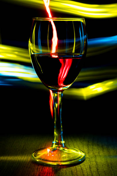 istock A glass of wine on a bright background with a bokeh effect. 924124652