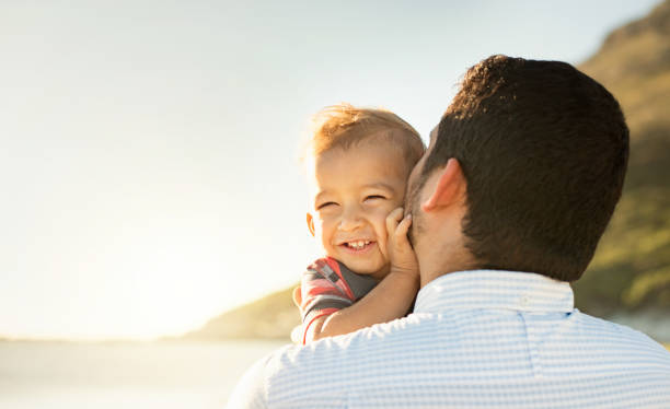 istock Father and son having fun and enjoying spending time together outdoors 924126112