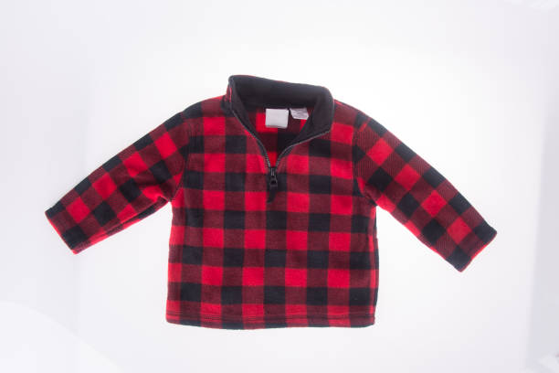 istock baby clothes on the background. 924136374