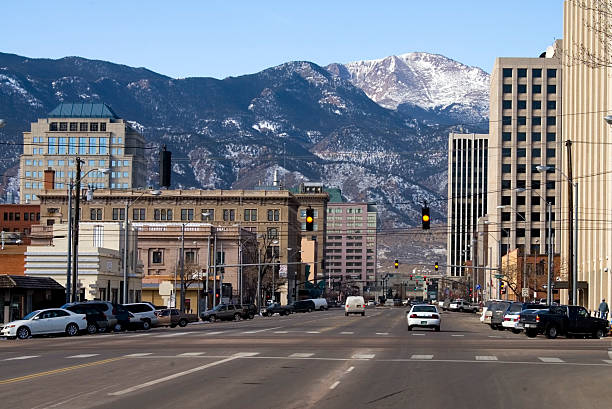 Pikes Peak Avenue Colorado Springs Downtown Colorado Springs Colorado looking west from Pikes Peak Avenue towards Pikes Peak and the Rocky Mountains. colorado springs city stock pictures, royalty-free photos & images