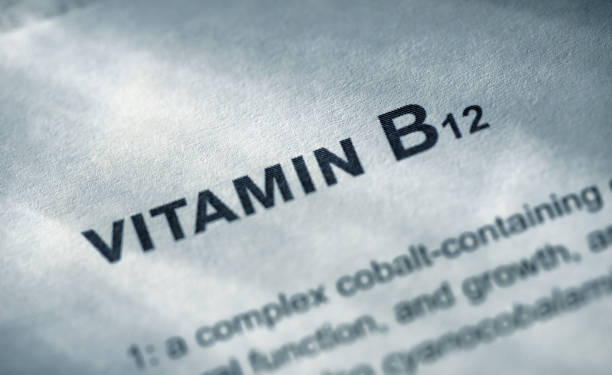 vitamine b12 - pill vitamin b vitamin pill orange photos et images de collection