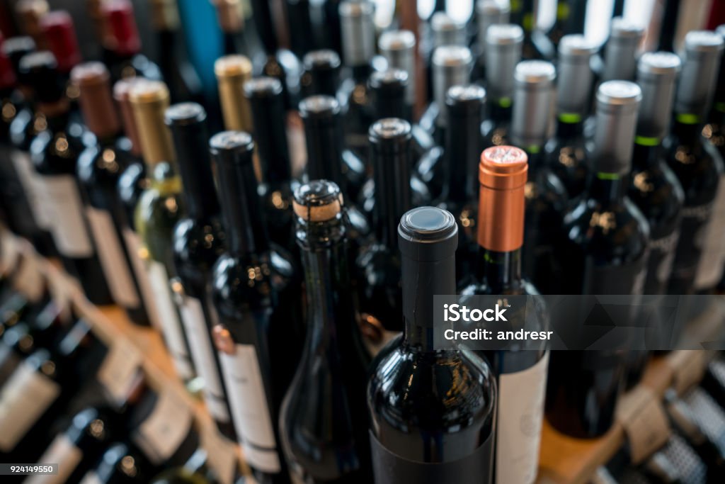 Close up of different wine bottles at a wine store Wine Bottle Stock Photo