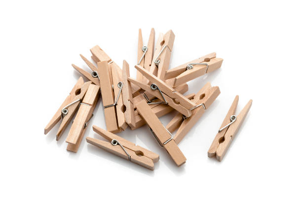 istock Clothes pins heap isolated on white background 924153124