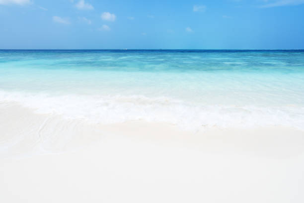 istock Sea waves and sandy beach background 924153468