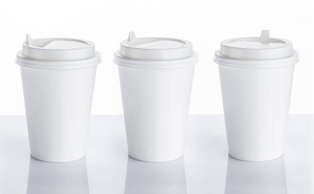 istock White disposable paper cup isolated on white background 924153696