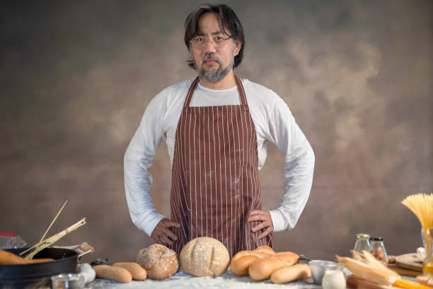 istock Man Chef hipster stylish with baguette on the beautiful background 924160162