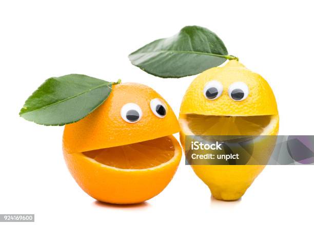 Laughing Orange And Lemon With Leaf Isolated On White Background Stock Photo - Download Image Now