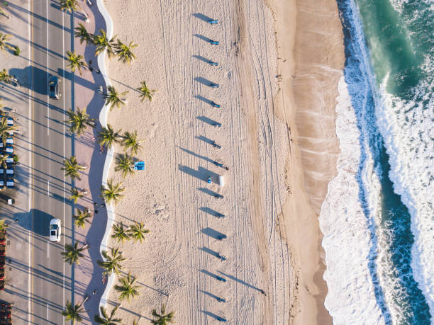 Fort Lauderdale Beach at sunrise from drone point of view Fort Lauderdale Beach at sunrise from drone point of view florida beach above stock pictures, royalty-free photos & images