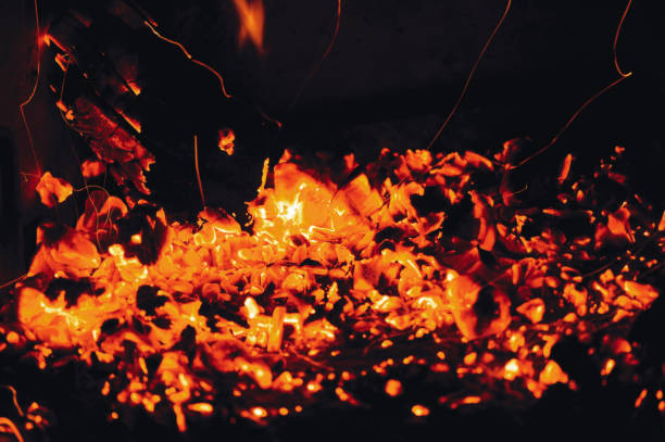 istock Hot red coals from firewood in a fireplace 924169946