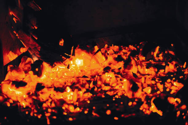 istock Hot red coals from firewood in a fireplace 924169950