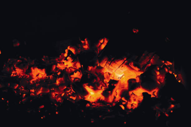 istock Hot red coals from firewood in a fireplace 924169952
