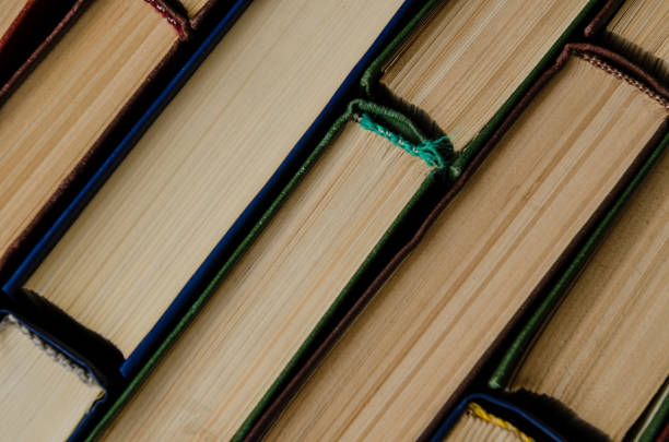 istock Many old books, top view, like background 924185776