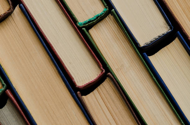 istock Many old books, top view, like background 924185802