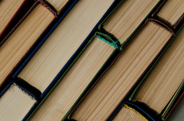 istock Many old books, top view, like background 924185880
