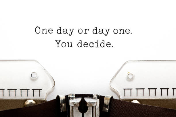 One Day Or Day One You Decide On Typewriter One day or day one. You decide. printed on old typewriter. new life stock pictures, royalty-free photos & images