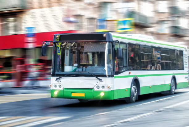istock bus goes along street 924195216