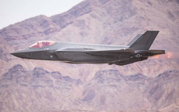 istock F-35 Lightning II against the Nevada hills, with afterburner on 924201048