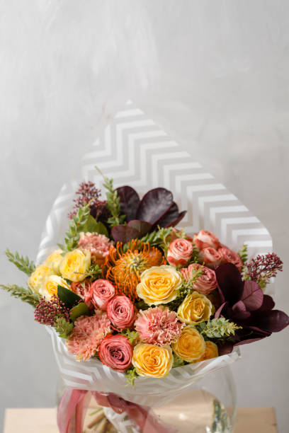 istock Flower composition on a gray background. Bouquet from spring flowers. copy space 924204624