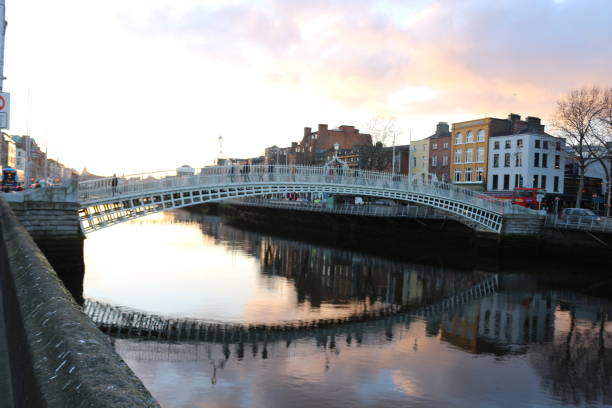 istock Dublin night scene with Ha'penny bridge and Liffey river lights . Ireland 924207962