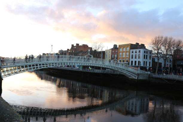 istock Dublin night scene with Ha'penny bridge and Liffey river lights . Ireland 924208132