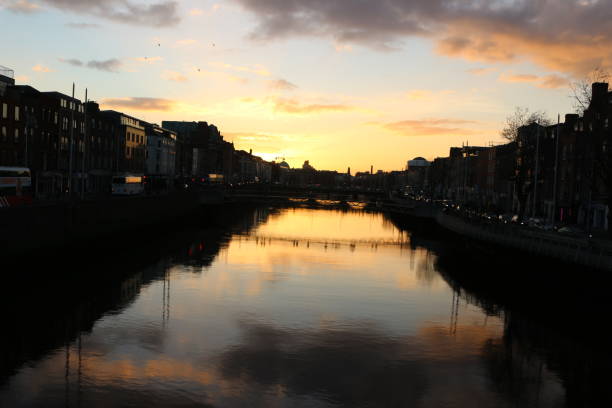 istock Dublin night scene with Ha'penny bridge and Liffey river lights . Ireland 924208174