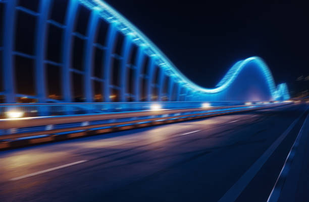 istock motion-blurred Blue bridge at night, Dubai 924212060