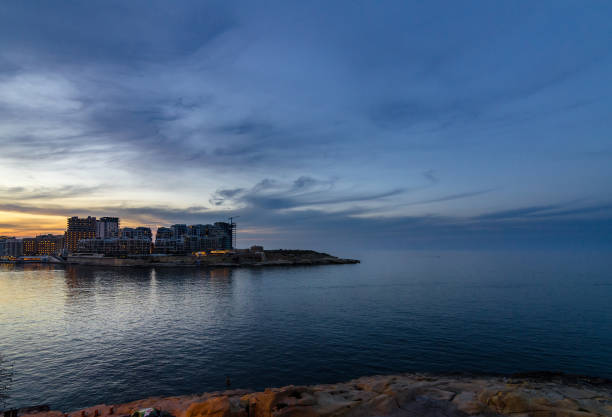 istock Sunset over new constractions in Sliema, Malta 924227592