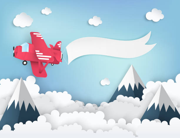 istock Paper art background with paper clouds, high mountains, red airplane with banner. 924236692