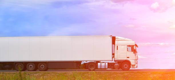 istock truck is driving on a country road 924243320