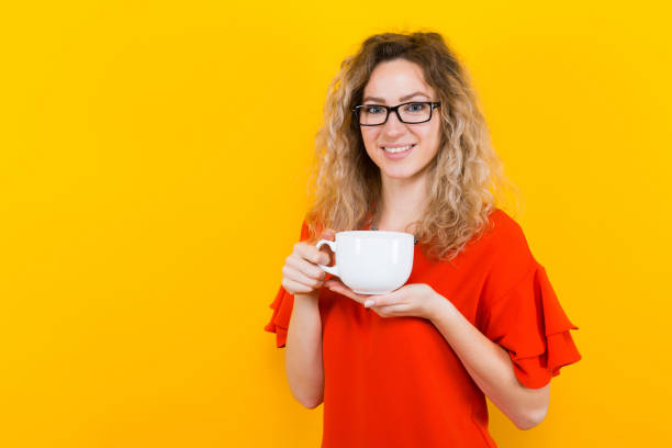 istock Woman in dress with cup 924254194