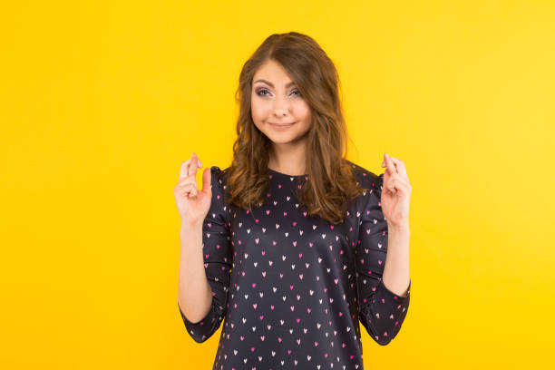istock Attractive woman with crossed fingers 924256566
