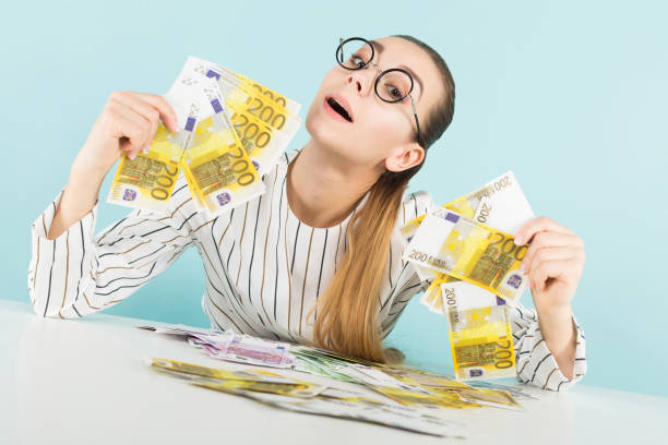 istock Attractive woman with cash 924256754