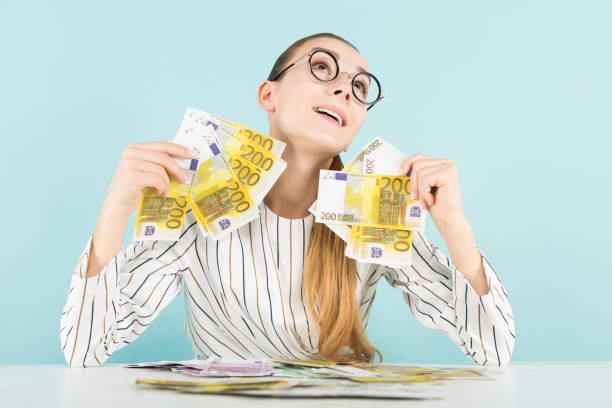 istock Attractive woman with cash 924256756