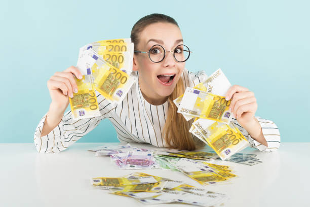 istock Attractive woman with cash 924256772