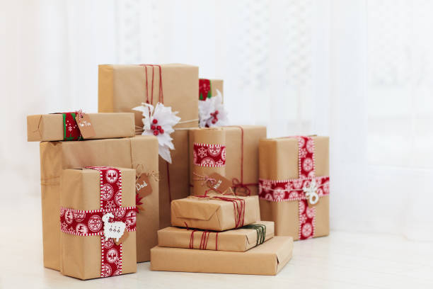 istock pile of wrapped handcrafted gift boxes on the floor 924264140