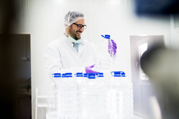 istock Young happy scientist is holding the empty bottle. 924267636