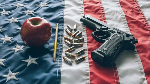 9mm handgun in school over usa flag - m9 imagens e fotografias de stock