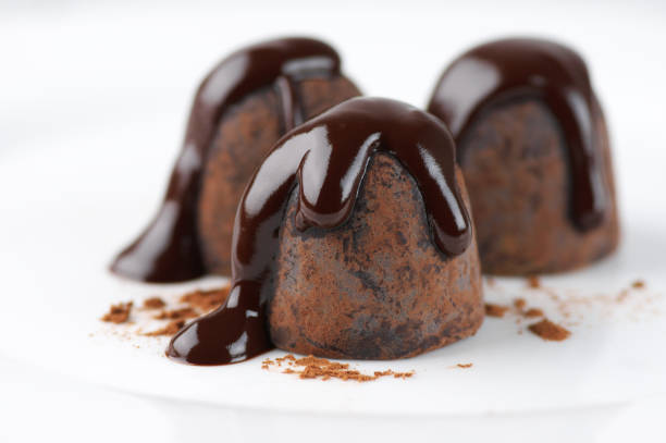 istock Chocolate truffles with chocolate sauce 924276154