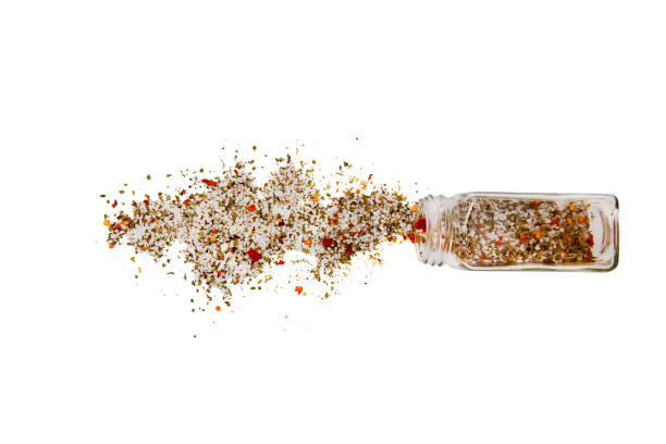 french seasoning spilled salt and mix of pepper. Isolated on a white background.  top view, flat lay pepper shaker stock pictures, royalty-free photos & images