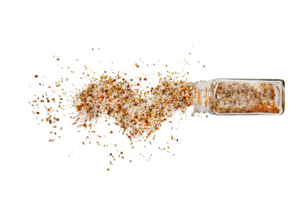 moroccan seasoning spilled moroccan seasoning mix. Isolated on a white background.  top view, flat lay salt seasoning stock pictures, royalty-free photos & images