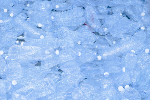 istock Composition with plastic bottles of mineral water. Plastic waste 924282536