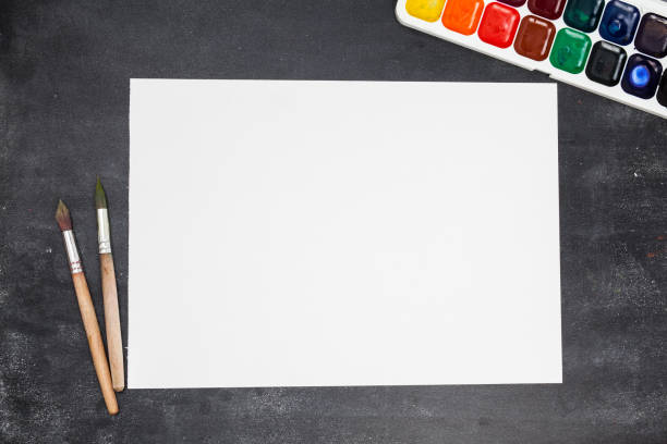 istock Paper, watercolors, paint brush on 924298346