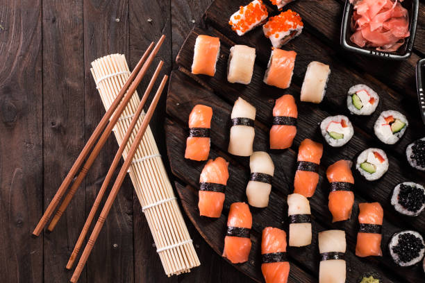 istock Various kinds of sushi served on a platter with soy sauce 924301366